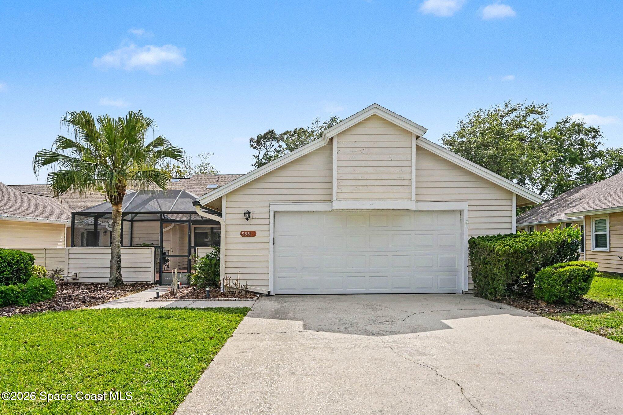 a view of outdoor space yard and garage