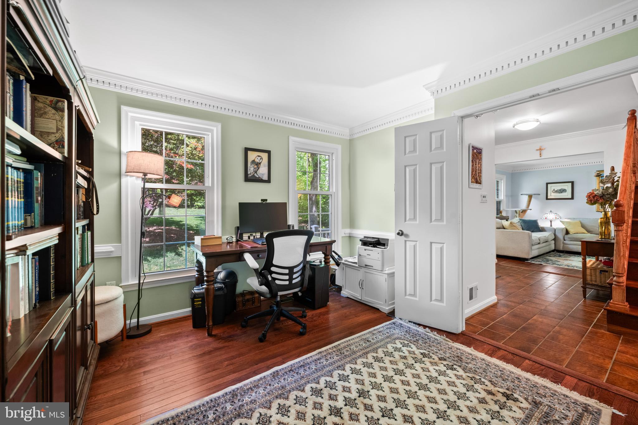 7362 Clifton Road Clifton, VA 20124 - Photo 13 of 53 a workspace with furniture bookshelf and a window