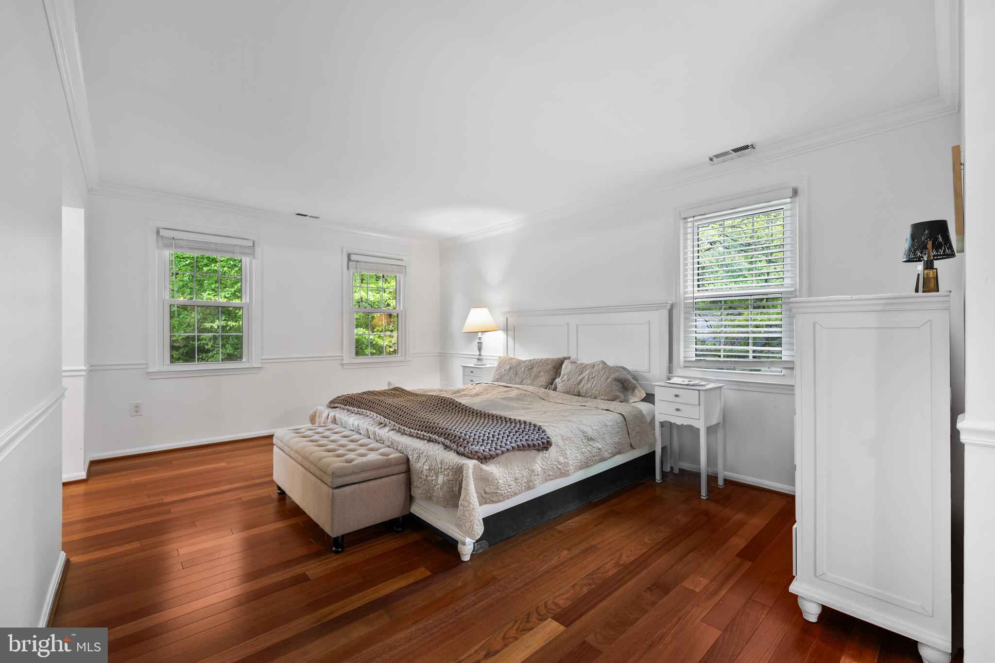7362 Clifton Road Clifton, VA 20124 - Photo 17 of 53 a bedroom with a bed and wooden floor