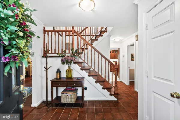 a view of entryway with a front door