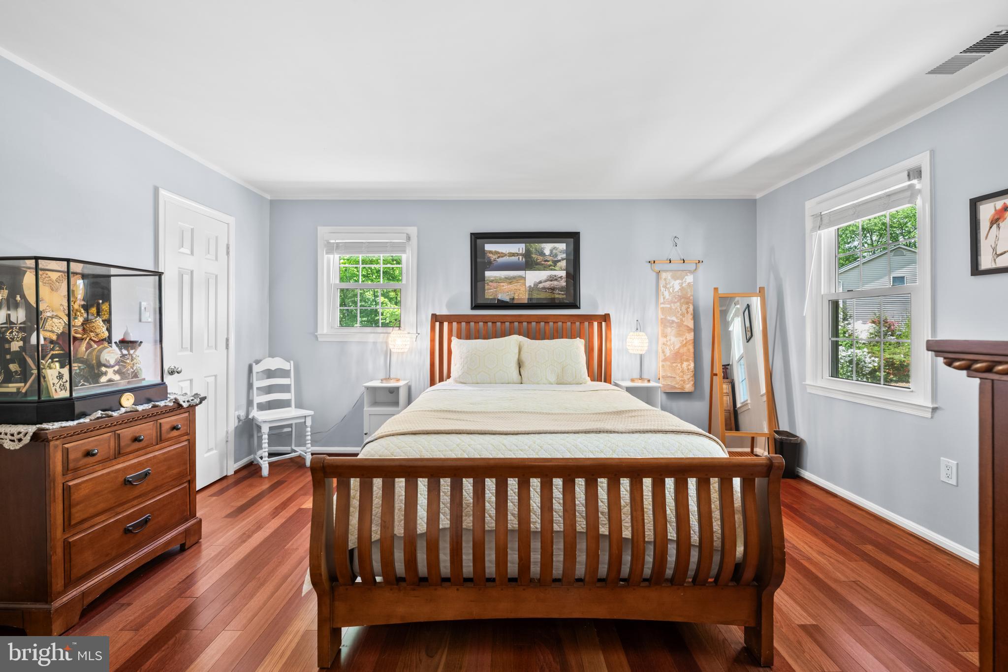 7362 Clifton Road Clifton, VA 20124 - Photo 28 of 53 a bedroom with a bed and wooden floor