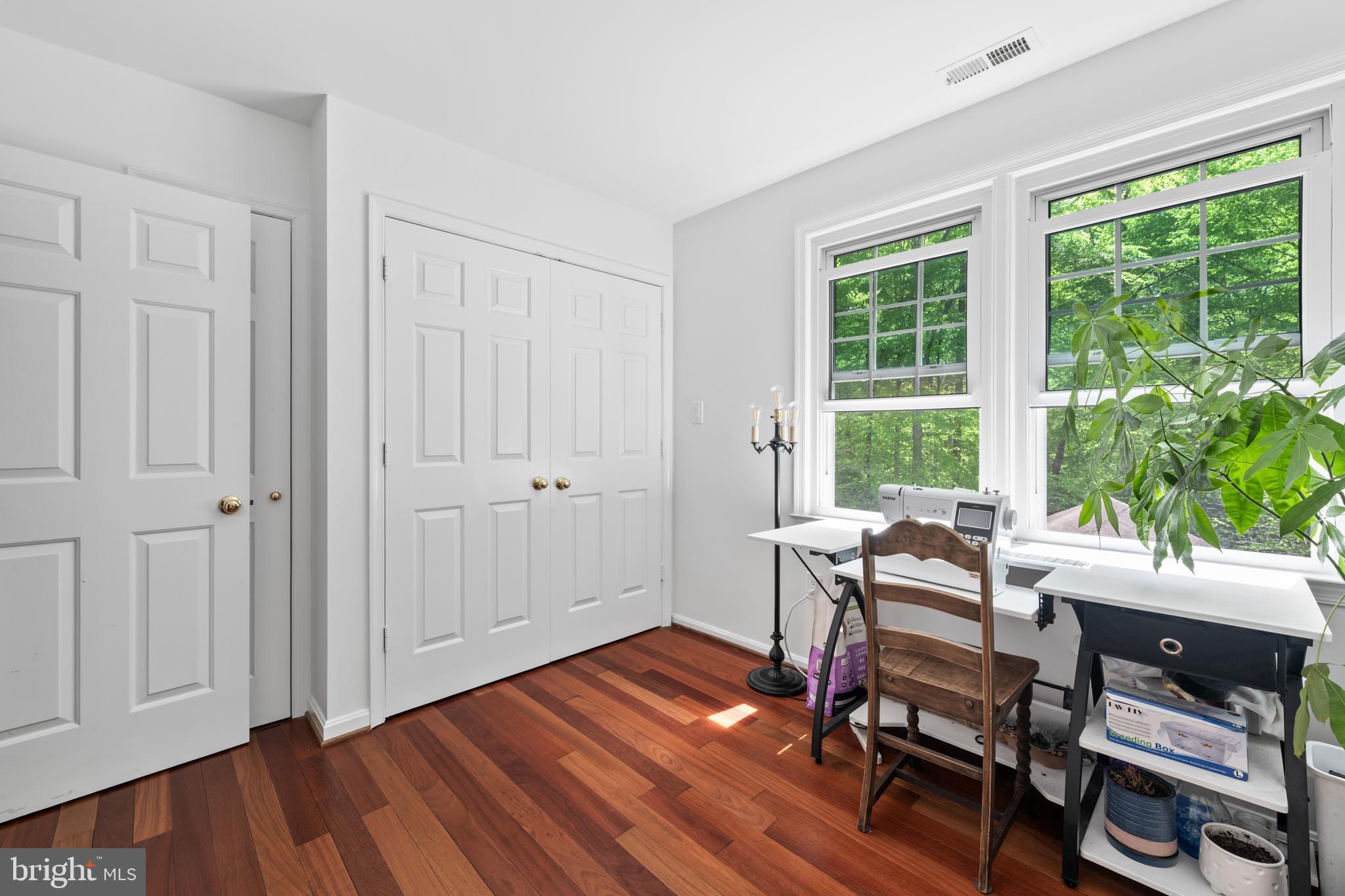 7362 Clifton Road Clifton, VA 20124 - Photo 31 of 53 a workspace with wooden floor and furniture
