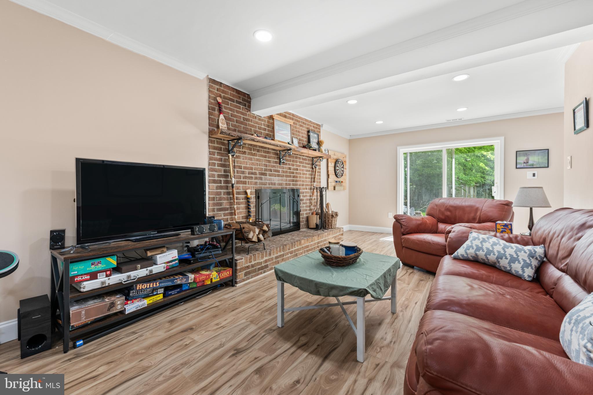 7362 Clifton Road Clifton, VA 20124 - Photo 35 of 53 a living room with furniture and a flat screen tv