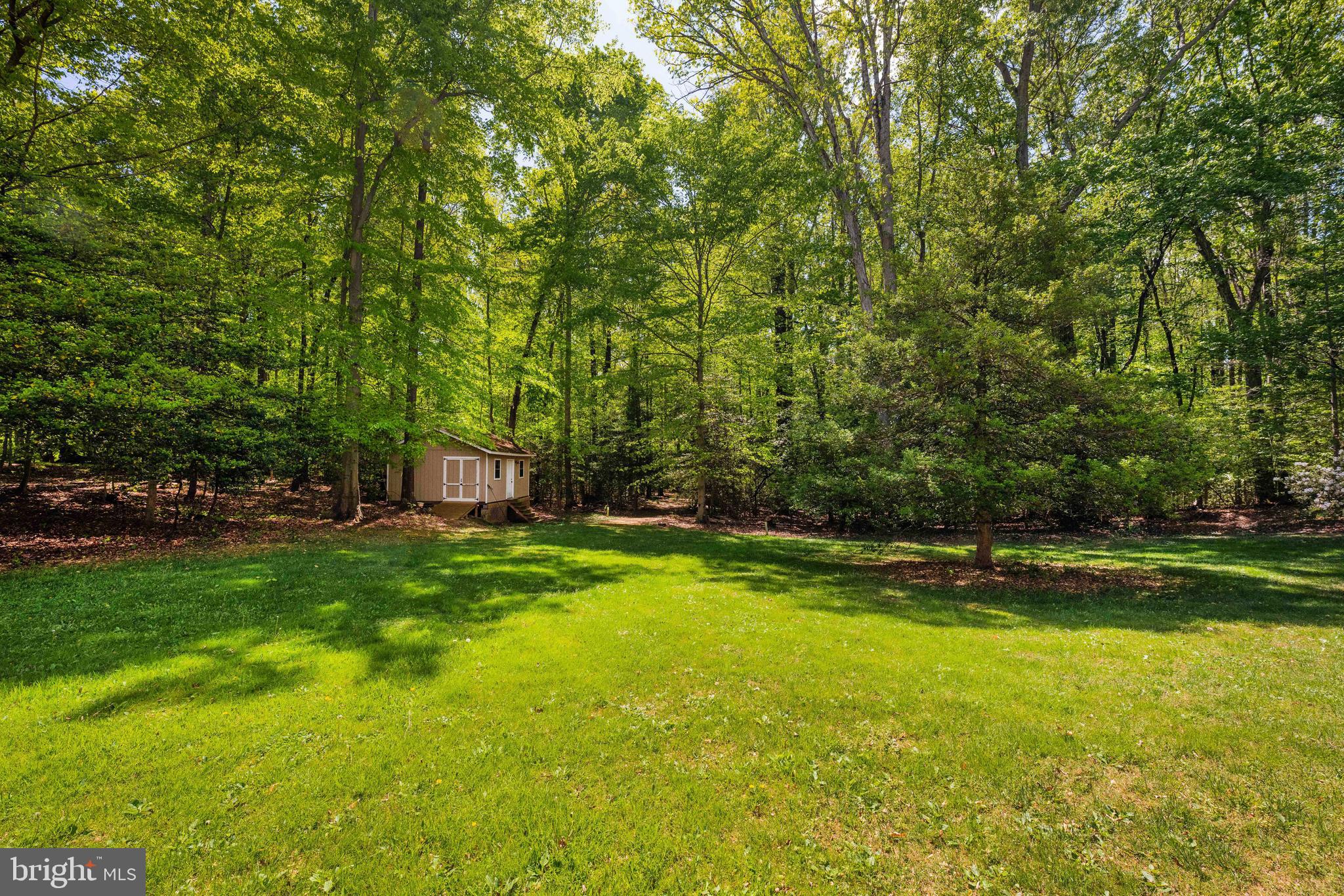 7362 Clifton Road Clifton, VA 20124 - Photo 48 of 53 a view of a backyard with swimming pool