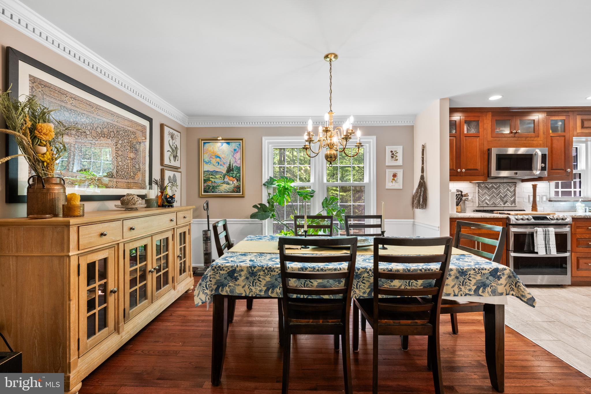 7362 Clifton Road Clifton, VA 20124 - Photo 5 of 53 a view of a dining room with furniture window and wooden floor