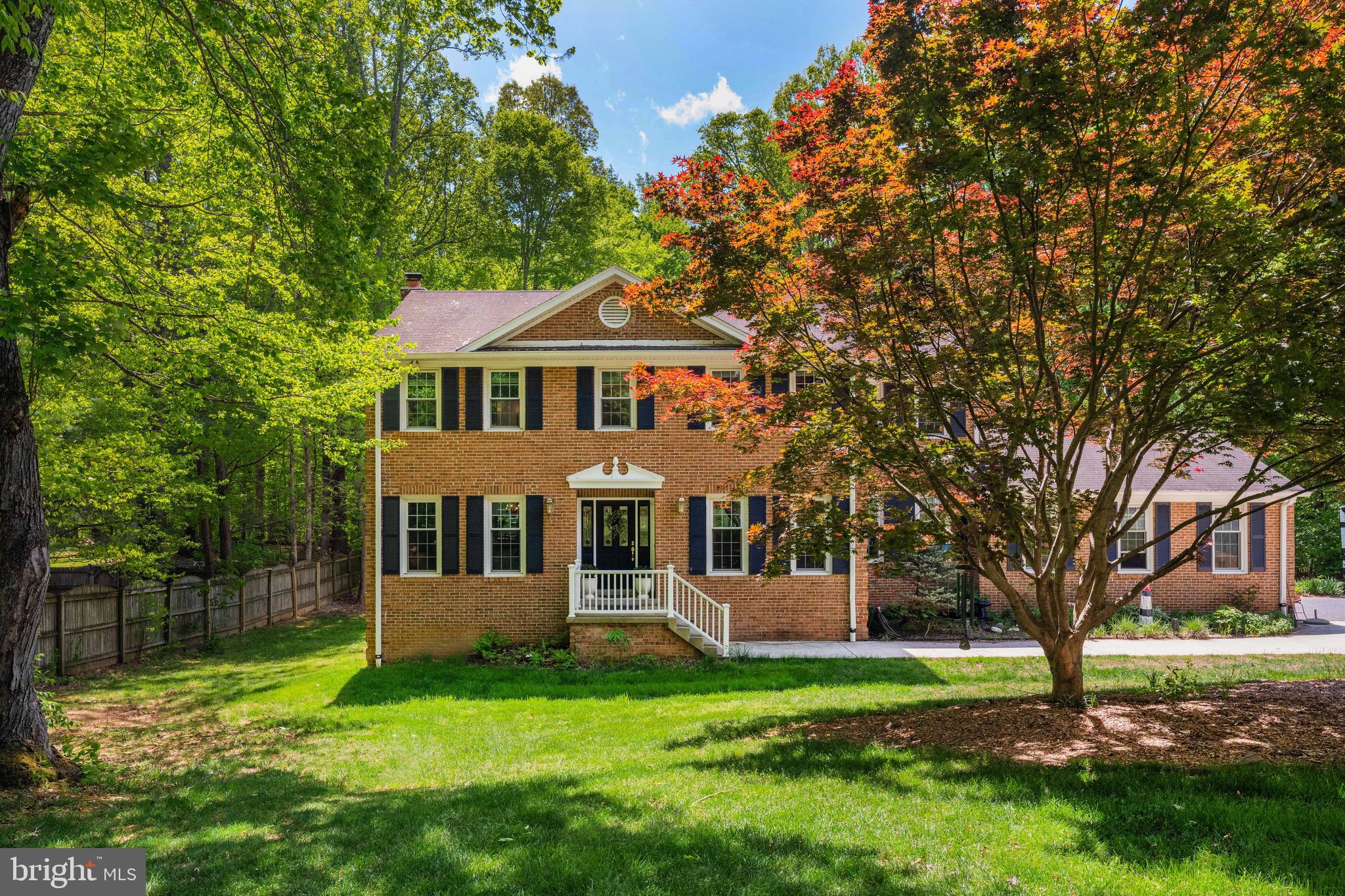 7362 Clifton Road Clifton, VA 20124 - Photo 53 of 53 a front view of a house with a yard