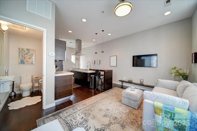 a living room with furniture and a table