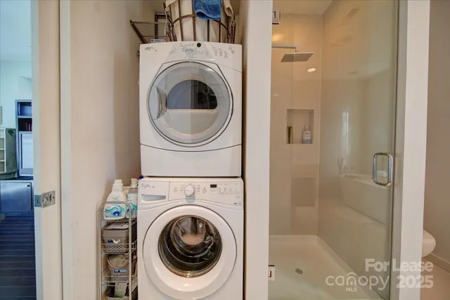 a view of a bathroom with a washer and dryer