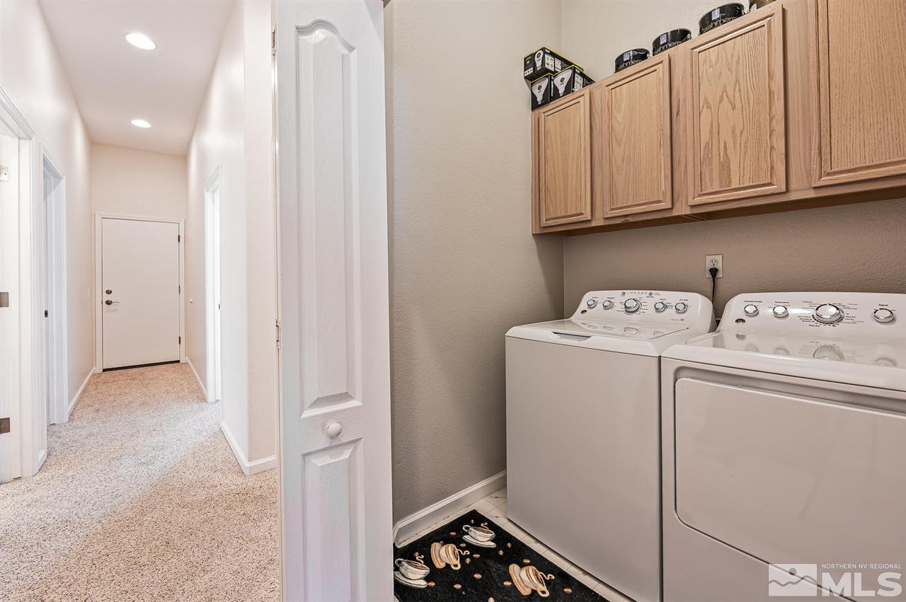 705 Gold Run Court Reno, NV 89521 - Photo 13 of 17 a utility room with dryer and washer