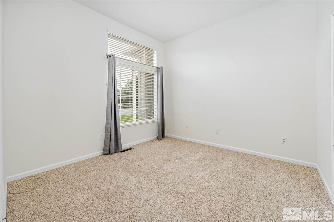 705 Gold Run Court Reno, NV 89521 - Photo 14 of 17 a view of an empty room with a window