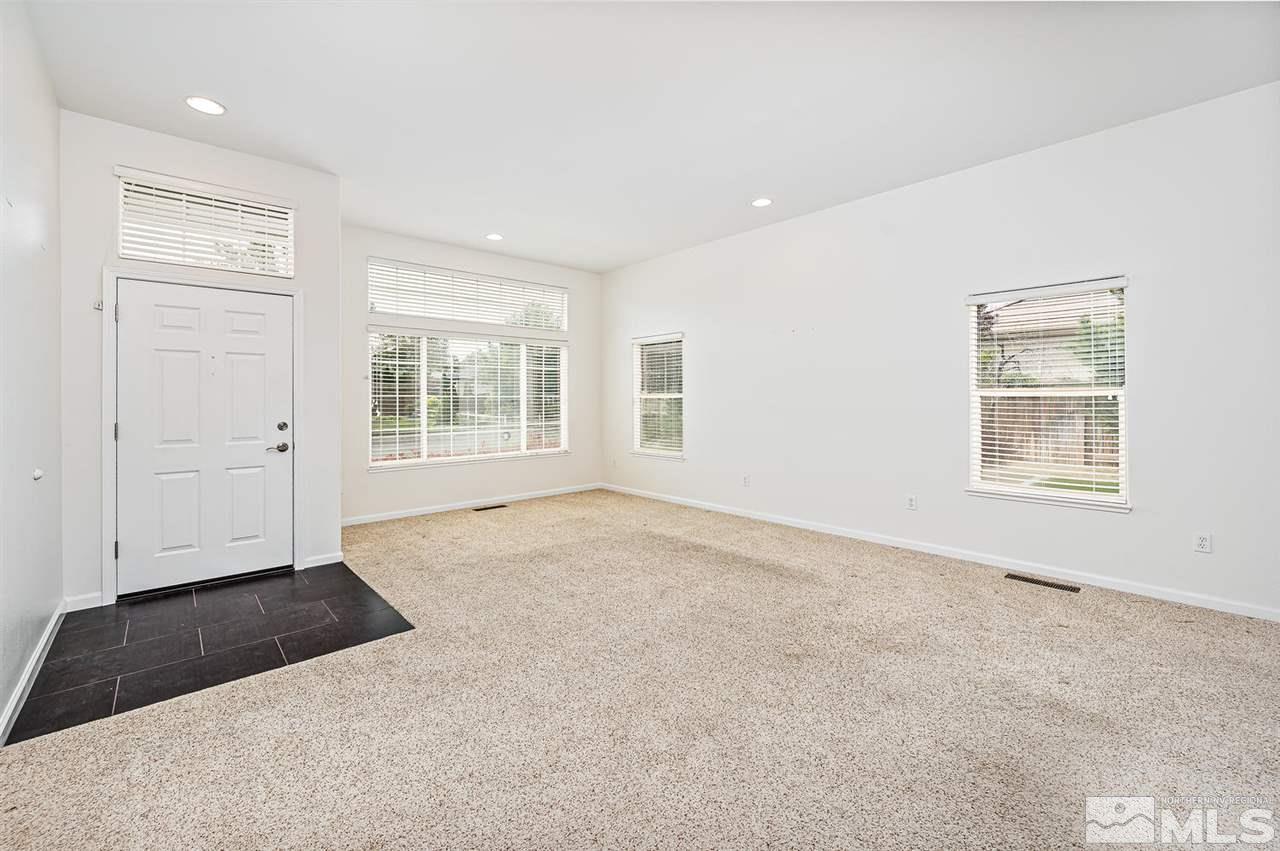 705 Gold Run Court Reno, NV 89521 - Photo 3 of 17 an empty room with windows