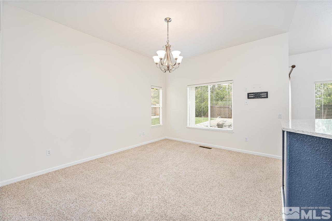 705 Gold Run Court Reno, NV 89521 - Photo 5 of 17 a view of an empty room with a window