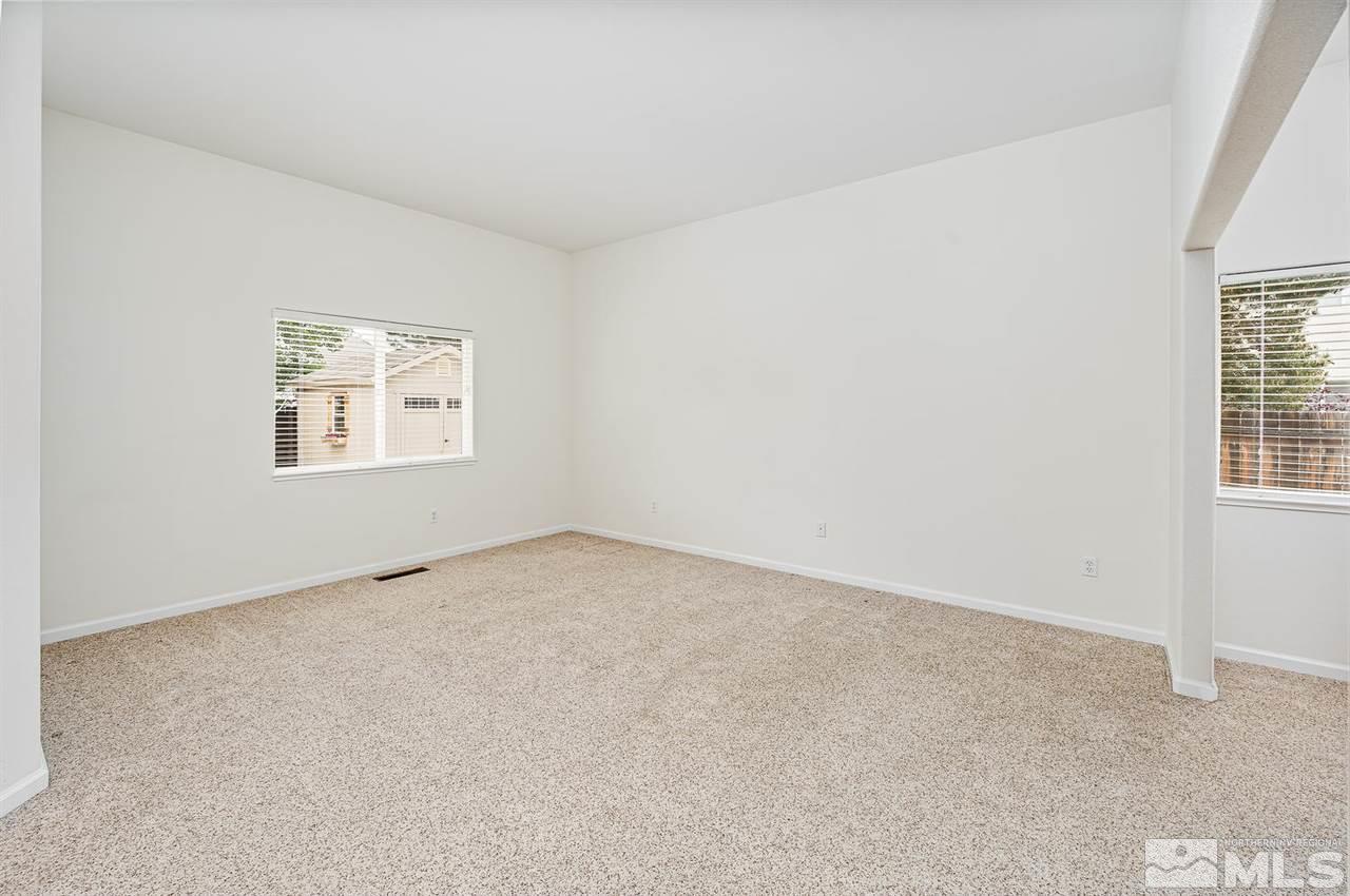 705 Gold Run Court Reno, NV 89521 - Photo 10 of 17 an empty room with windows