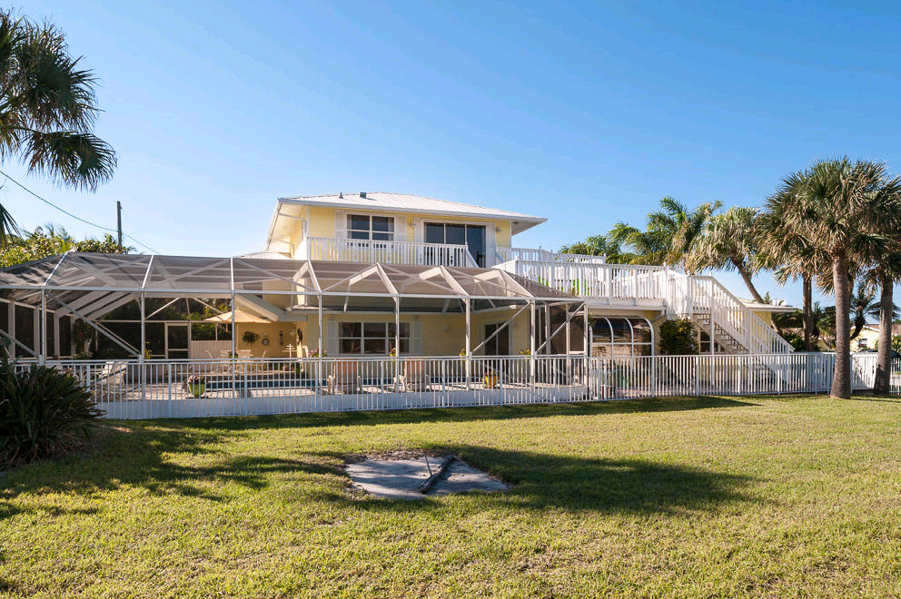3188 Cove Road Jupiter, FL 33469 - Photo 2 of 15 Rear View of House
