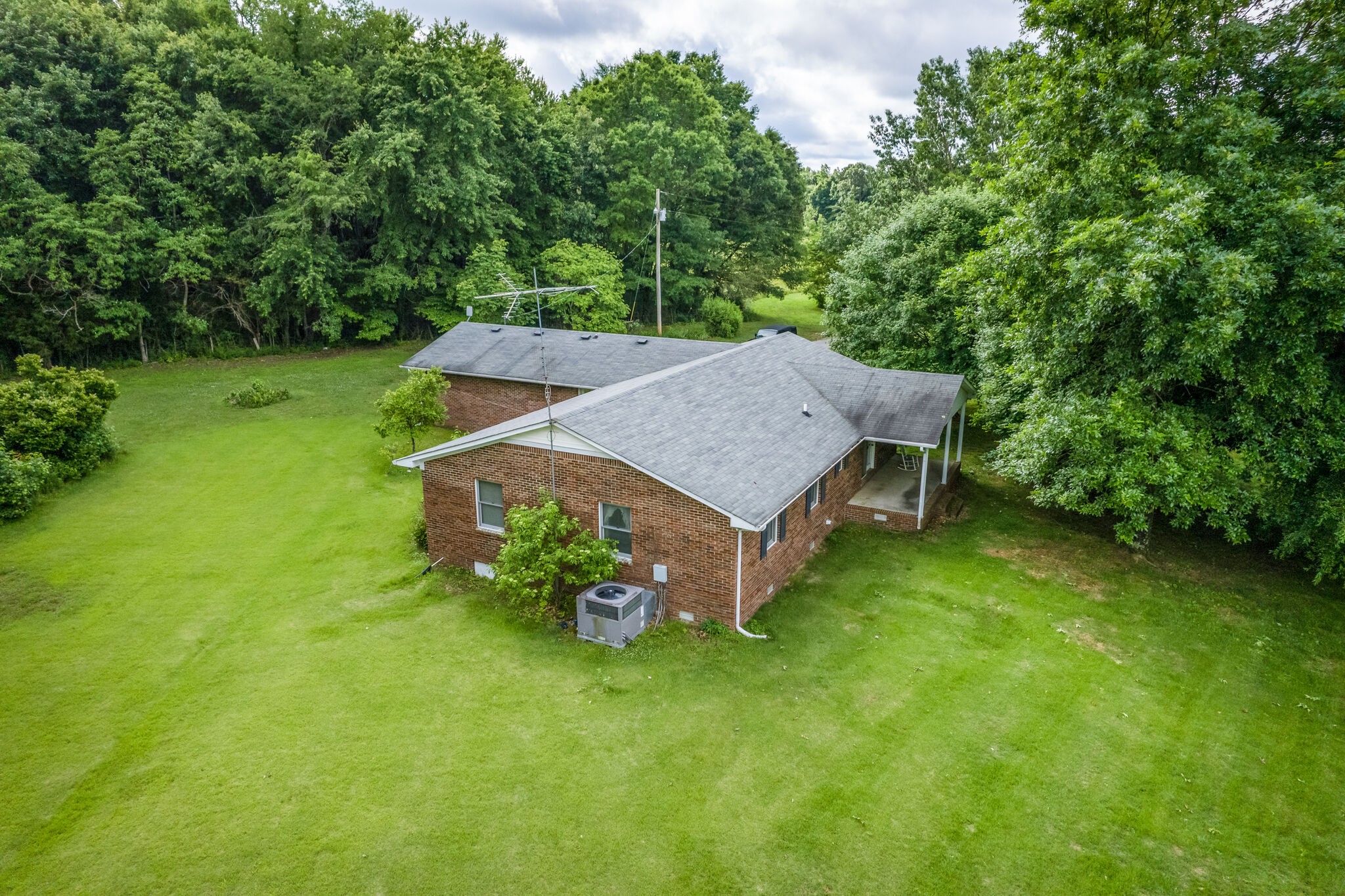 6200 Fall River Road Leoma, TN 38468 - Photo 4 of 29 an aerial view of a house with swimming pool and garden