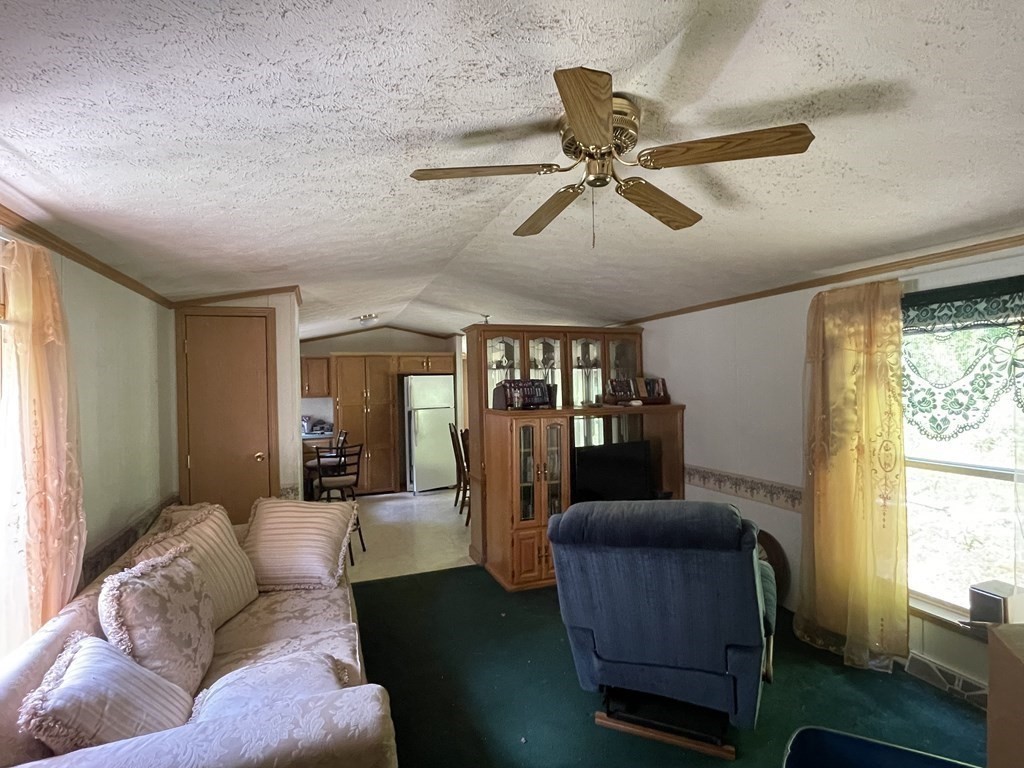 37 South County Road Florida, MA 01247 - Photo 12 of 21 a living room with furniture and a window