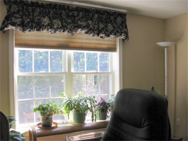 35 Easter Brook Road Lunenburg, MA 01462 - Photo 18 of 27 a view of a flower pot on a table near a window