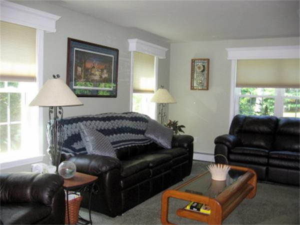 35 Easter Brook Road Lunenburg, MA 01462 - Photo 3 of 27 a living room with furniture and a lamp
