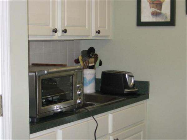 35 Easter Brook Road Lunenburg, MA 01462 - Photo 8 of 27 a kitchen with a stove and cabinets
