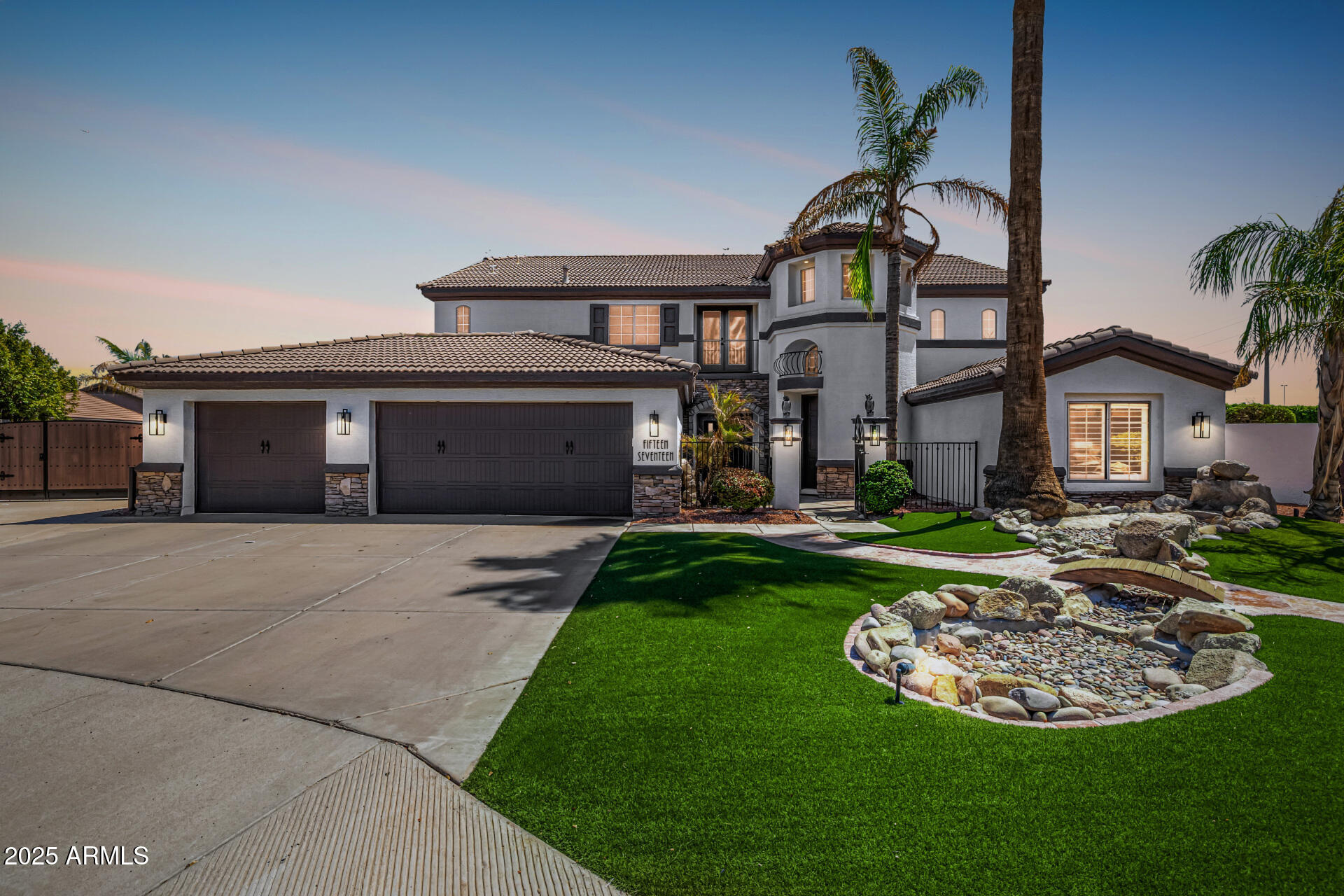 1517 South Arroya Circle Mesa, AZ 85206 - Photo 1 of 111 a front view of a house with a garden and plants