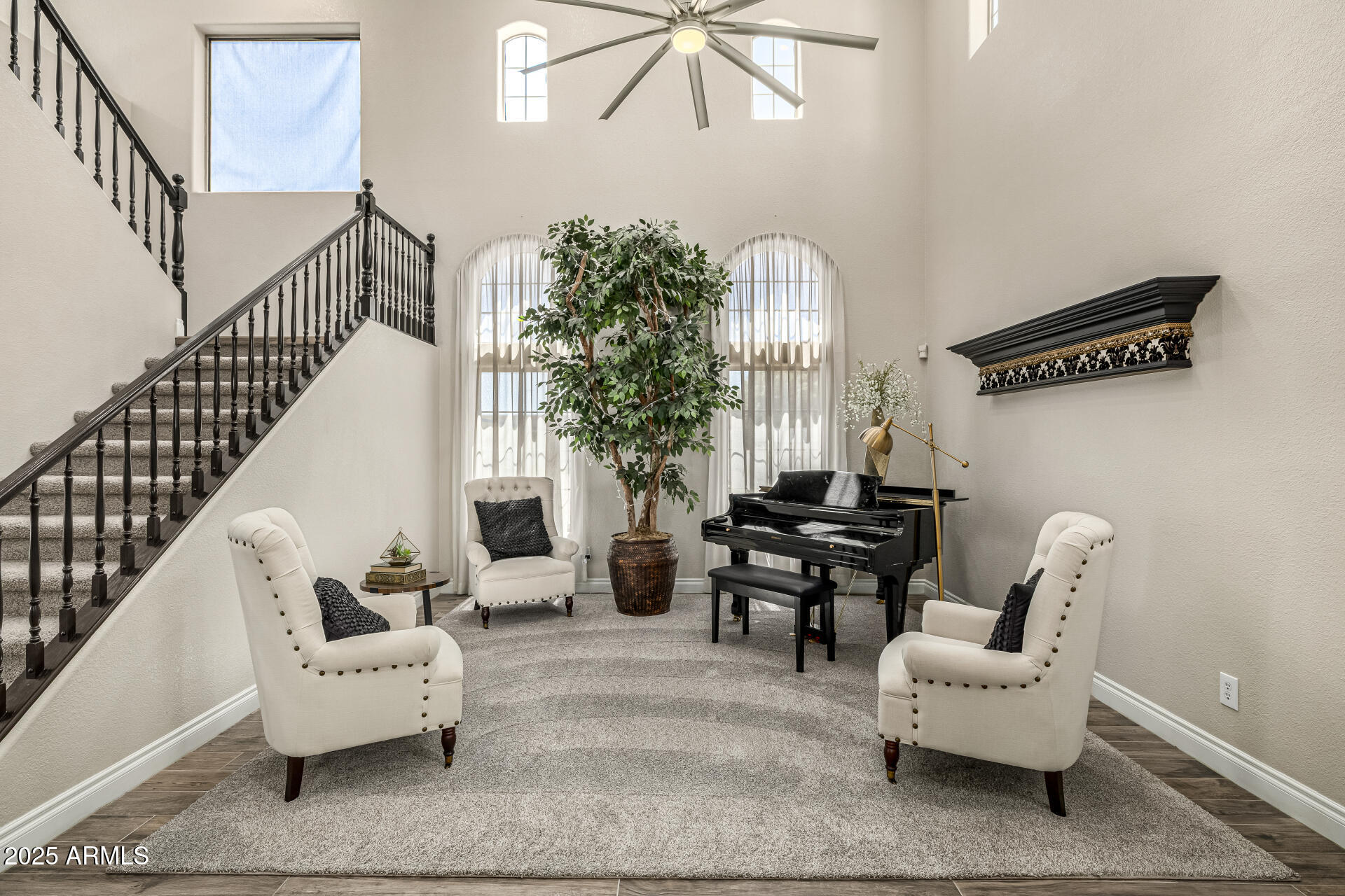 1517 South Arroya Circle Mesa, AZ 85206 - Photo 16 of 111 a living room with furniture and a large window