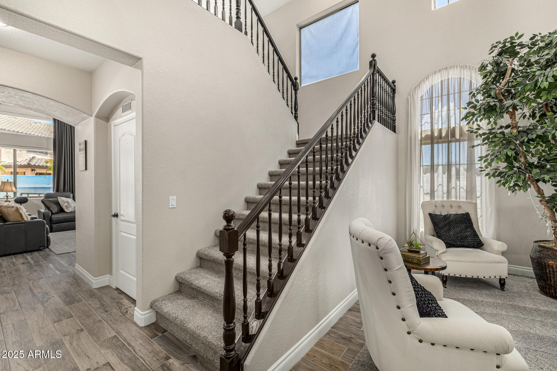 1517 South Arroya Circle Mesa, AZ 85206 - Photo 18 of 111 a view of entryway and hall with wooden floor