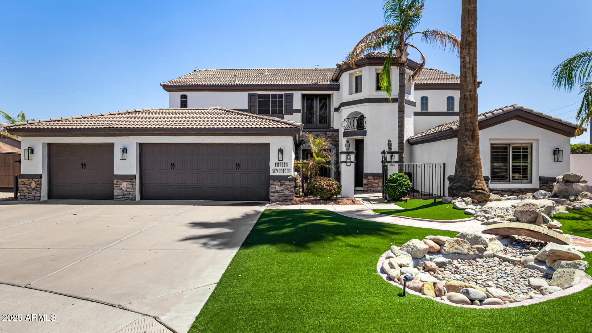 1517 South Arroya Circle Mesa, AZ 85206 - Photo 2 of 111 a front view of a house with a yard