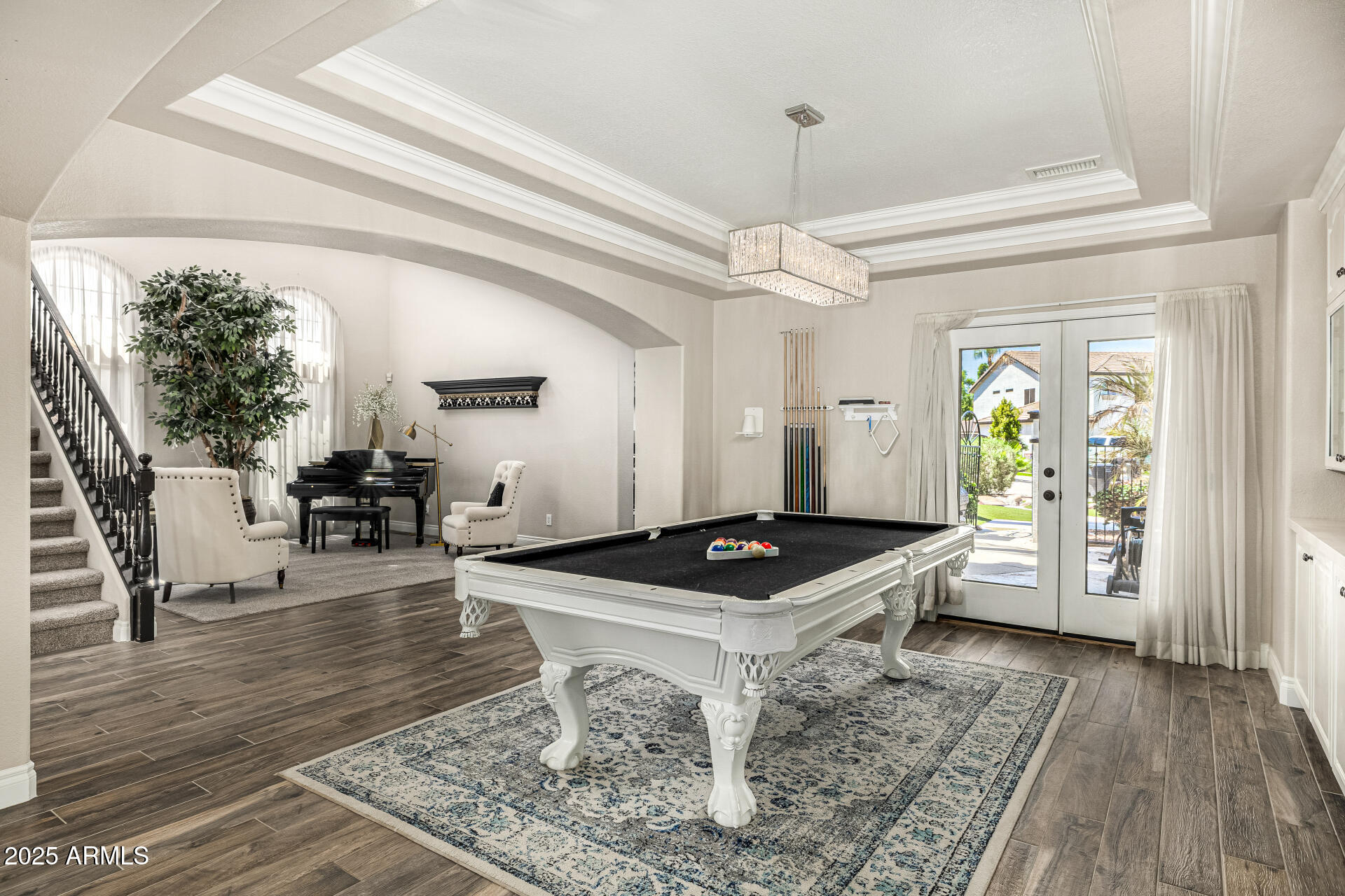 1517 South Arroya Circle Mesa, AZ 85206 - Photo 21 of 111 a living room with furniture and a wooden floor