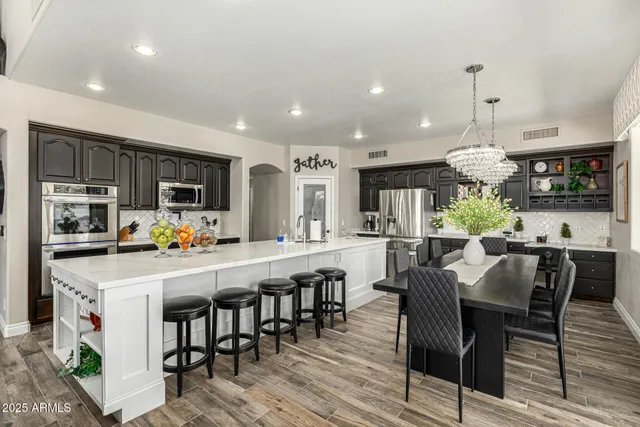 a bathroom with a sink double vanity and a mirror