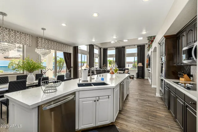 a bathroom with a shower a toilet and a sink