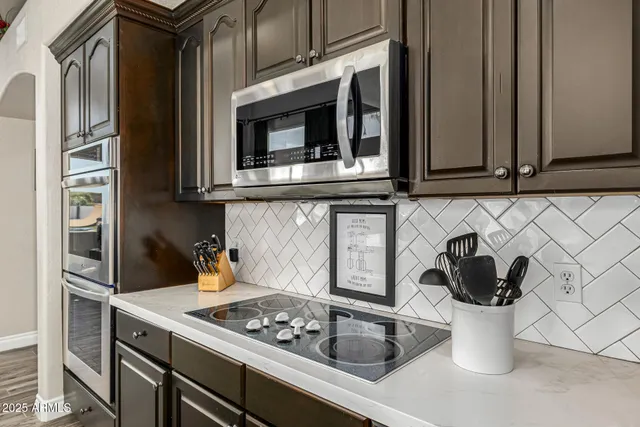 a bathroom with a shower and a glass door