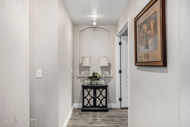 a room with furniture and a flat screen tv