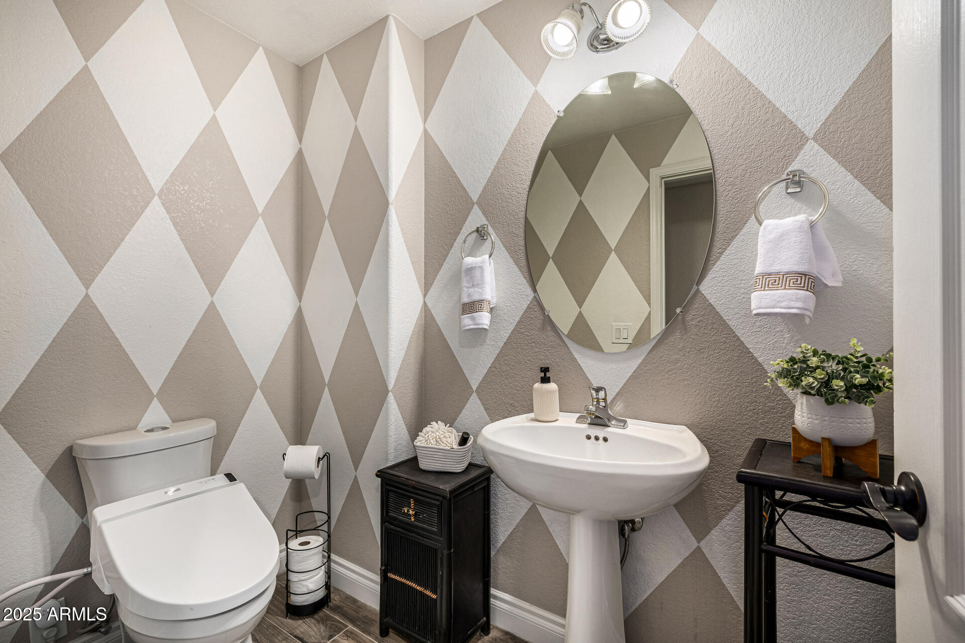 1517 South Arroya Circle Mesa, AZ 85206 - Photo 41 of 111 a bathroom with a sink toilet and a mirror