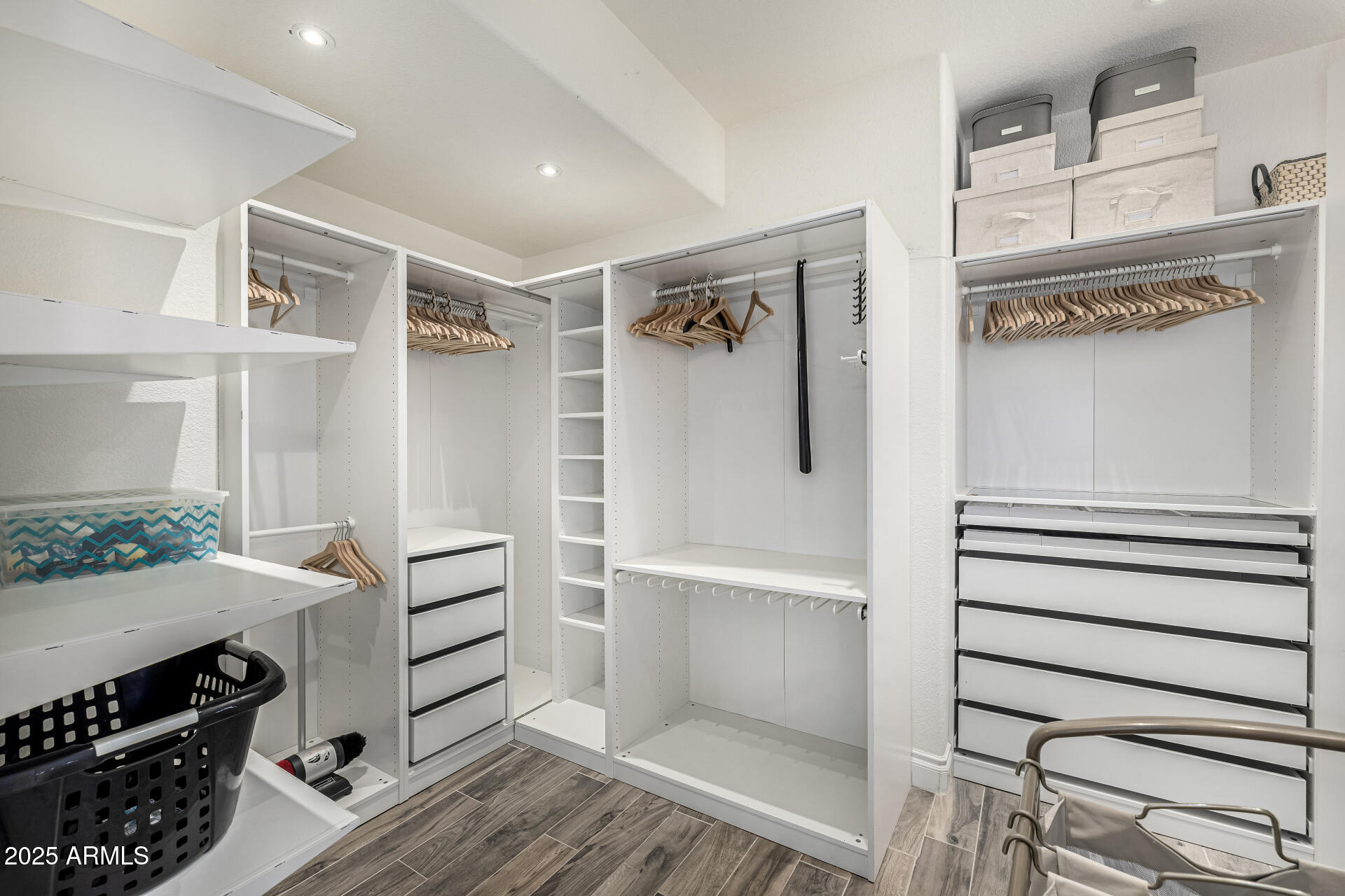 1517 South Arroya Circle Mesa, AZ 85206 - Photo 53 of 111 a view of walk in closet with empty racks