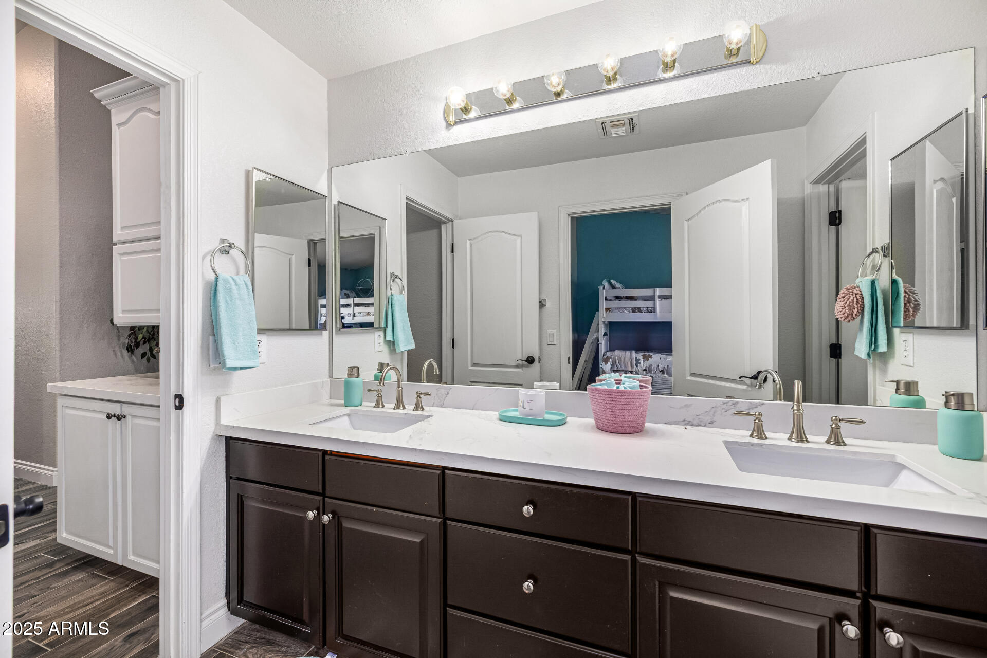 1517 South Arroya Circle Mesa, AZ 85206 - Photo 57 of 111 a bathroom with a sink double vanity and a mirror