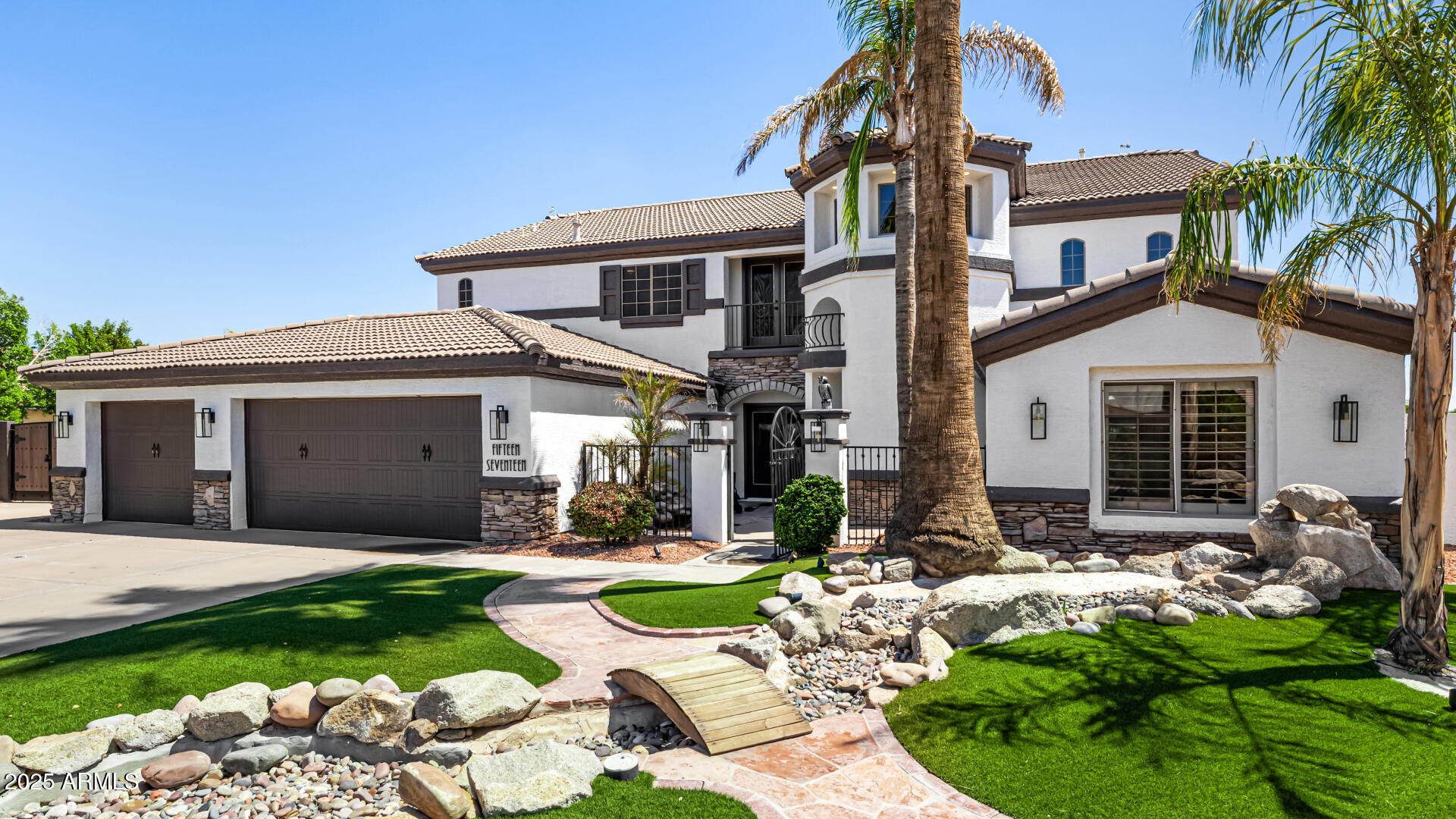 1517 South Arroya Circle Mesa, AZ 85206 - Photo 6 of 111 a front view of house with yard and outdoor seating