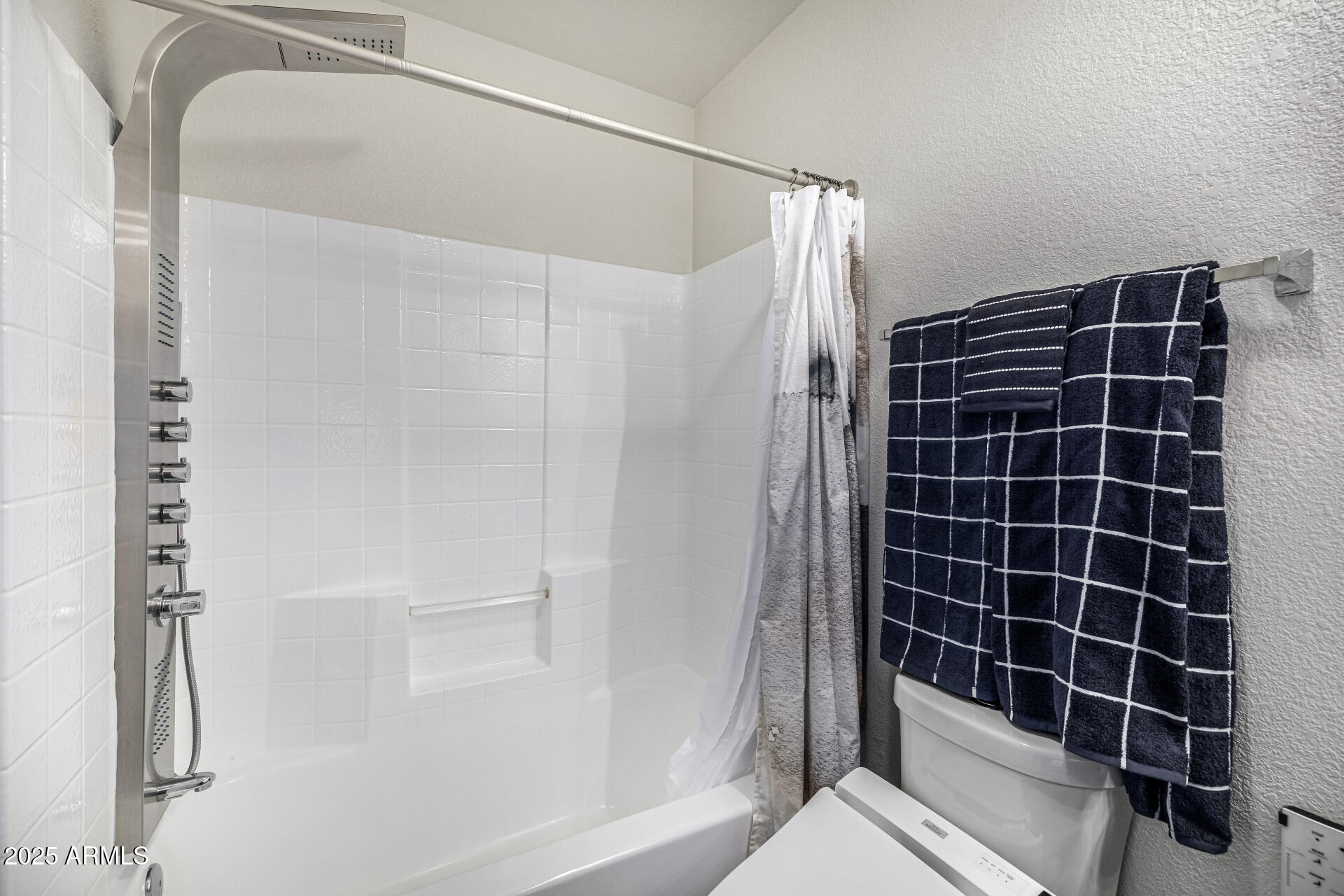 1517 South Arroya Circle Mesa, AZ 85206 - Photo 64 of 111 a bathroom with a shower and a glass door