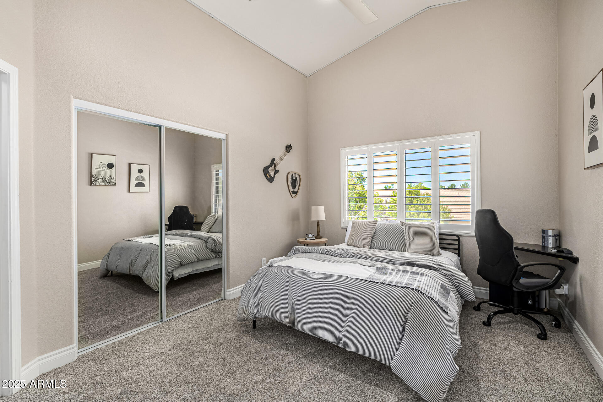 1517 South Arroya Circle Mesa, AZ 85206 - Photo 65 of 111 a bed sitting in a bedroom next to a window