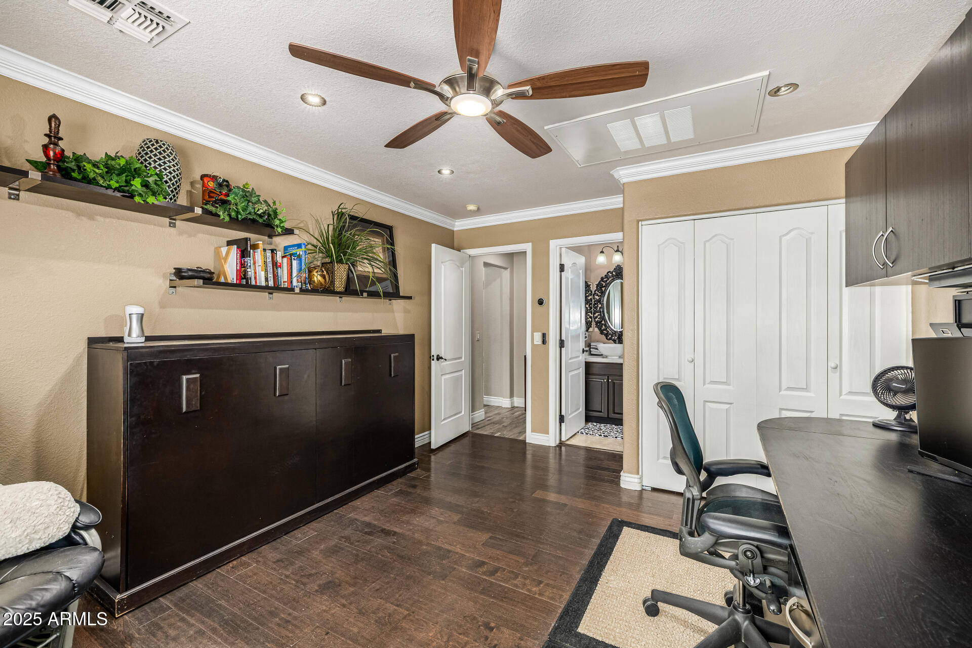 1517 South Arroya Circle Mesa, AZ 85206 - Photo 69 of 111 a view of a livingroom with furniture and a ceiling fan