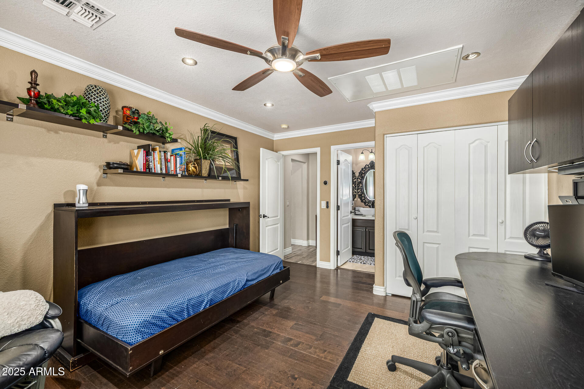 1517 South Arroya Circle Mesa, AZ 85206 - Photo 70 of 111 a bedroom with furniture and a chandelier