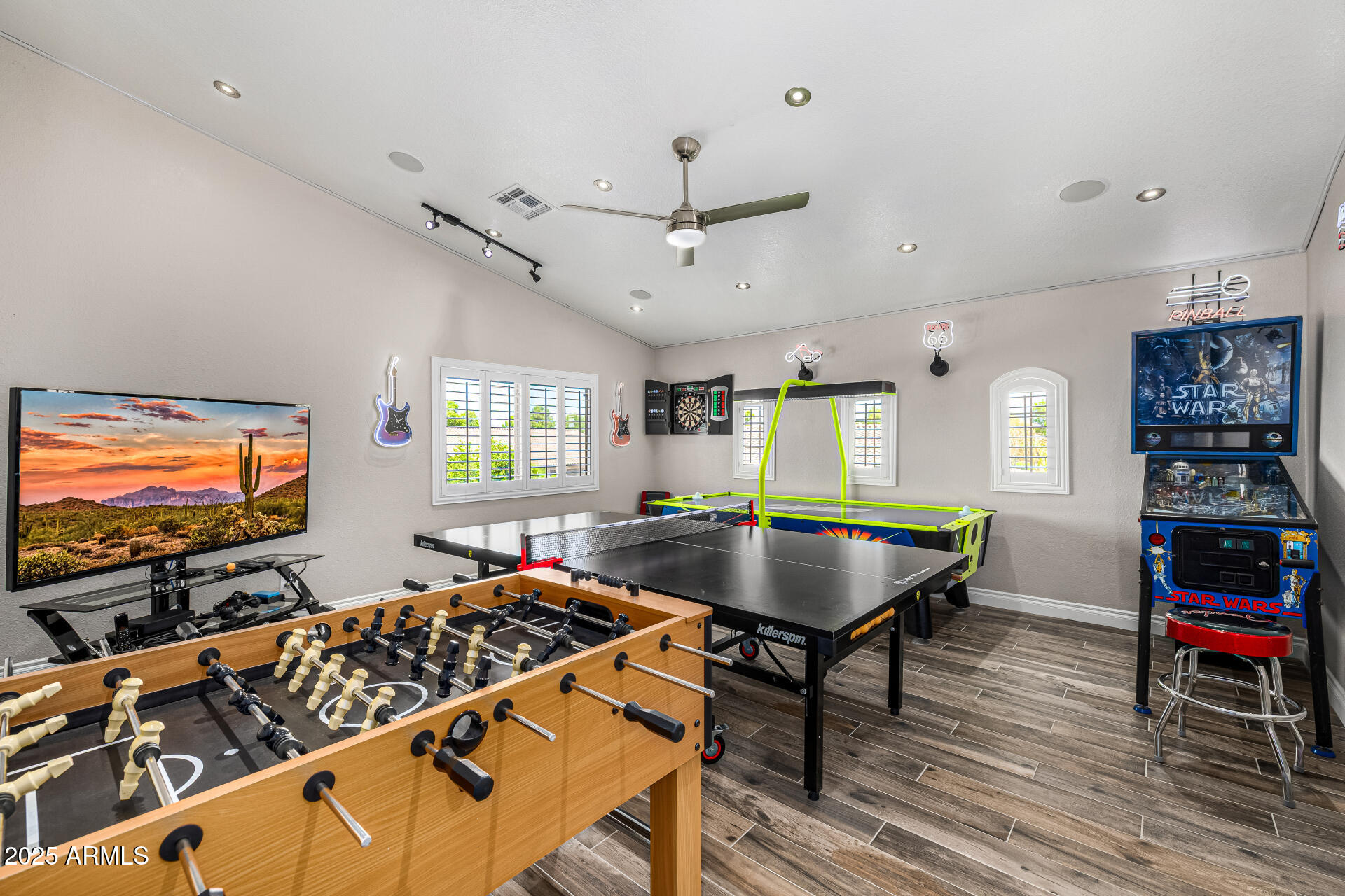 1517 South Arroya Circle Mesa, AZ 85206 - Photo 72 of 111 a living room with furniture and a flat screen tv