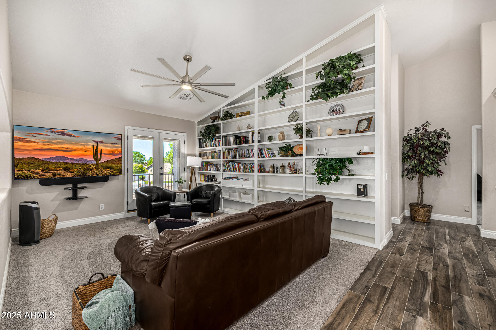 1517 South Arroya Circle Mesa, AZ 85206 - Photo 76 of 111 a living room with furniture and a flat screen tv