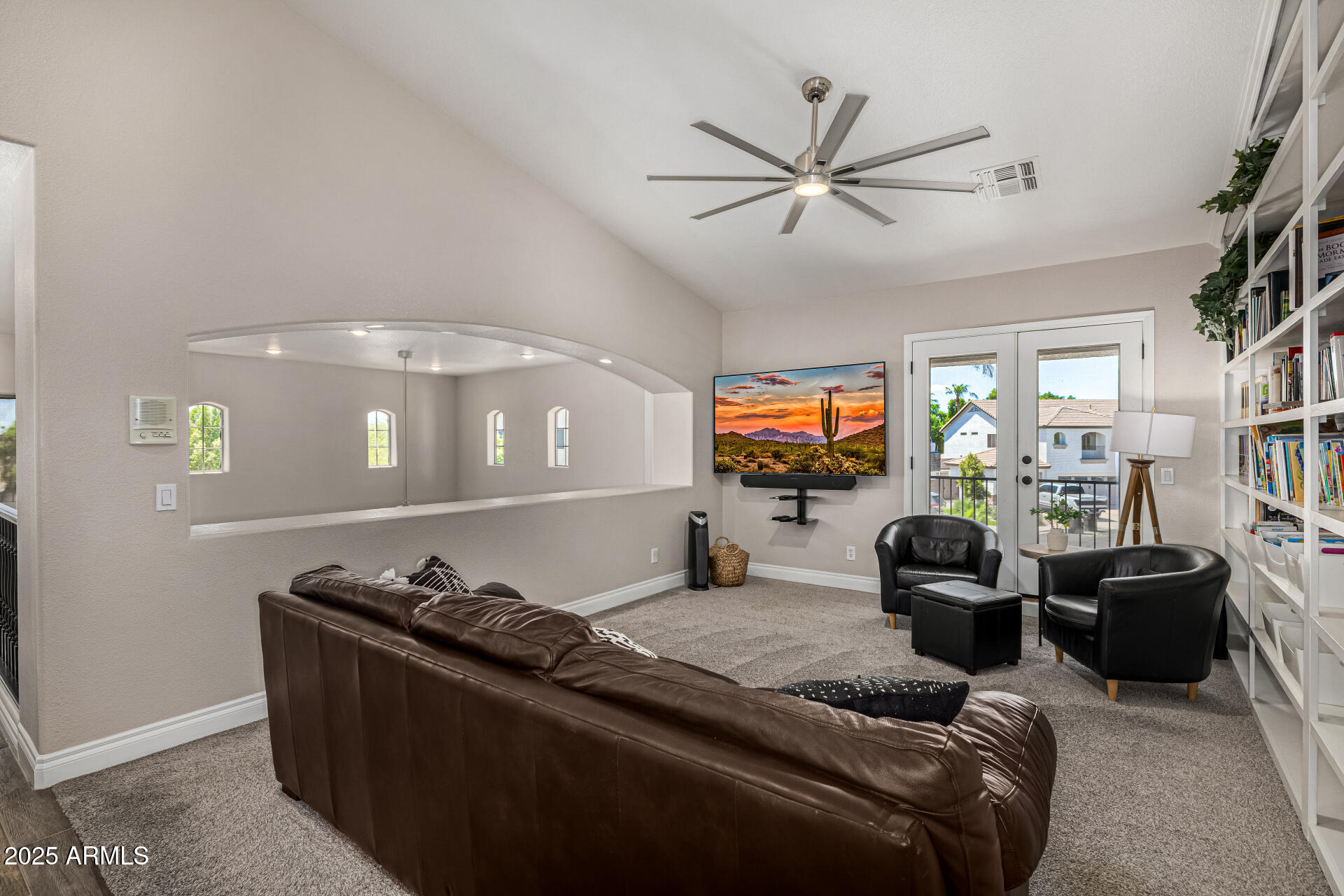 1517 South Arroya Circle Mesa, AZ 85206 - Photo 77 of 111 a living room with furniture and a flat screen tv