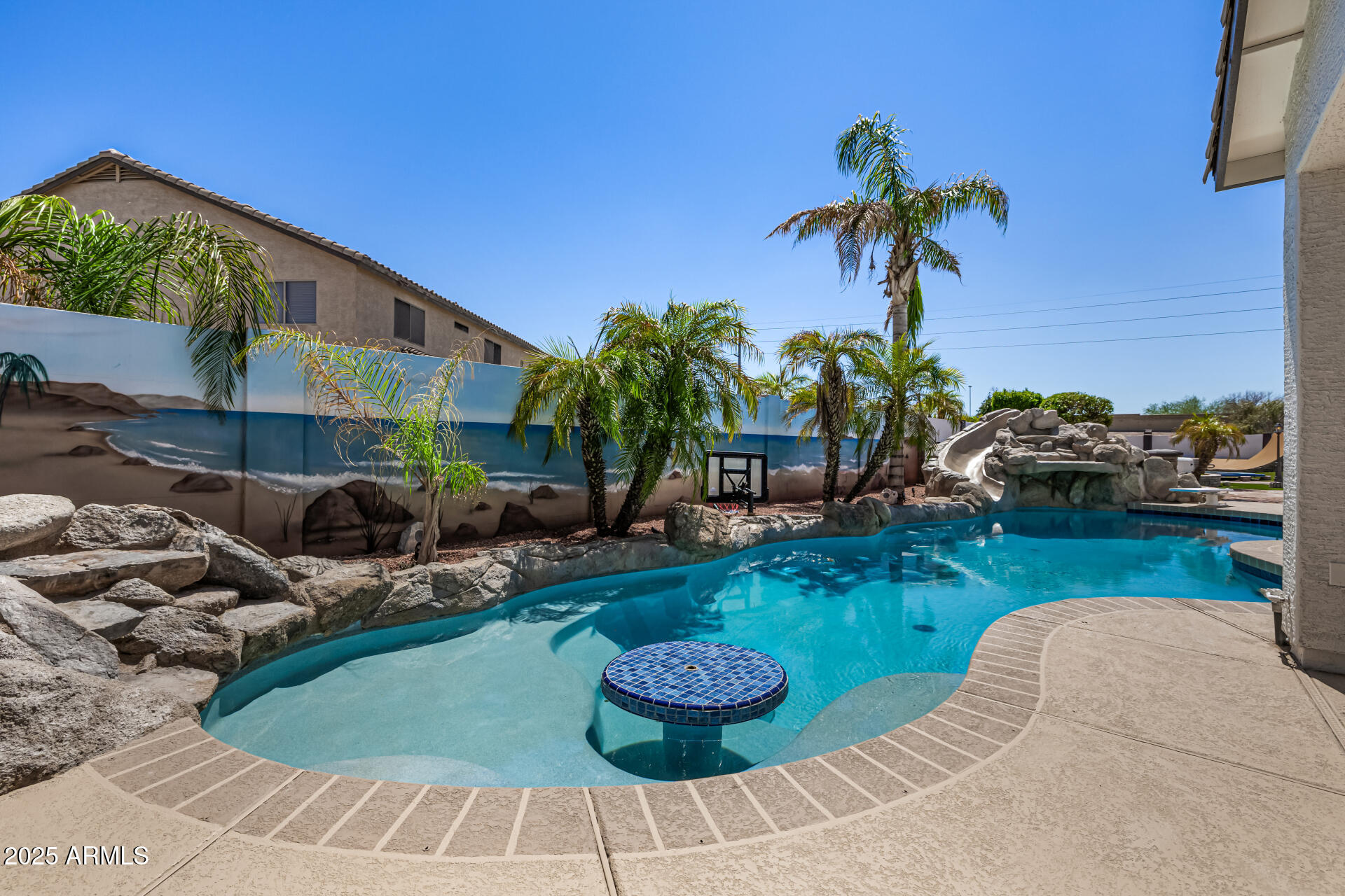 1517 South Arroya Circle Mesa, AZ 85206 - Photo 97 of 111 a view of a backyard with plants and swimming pool