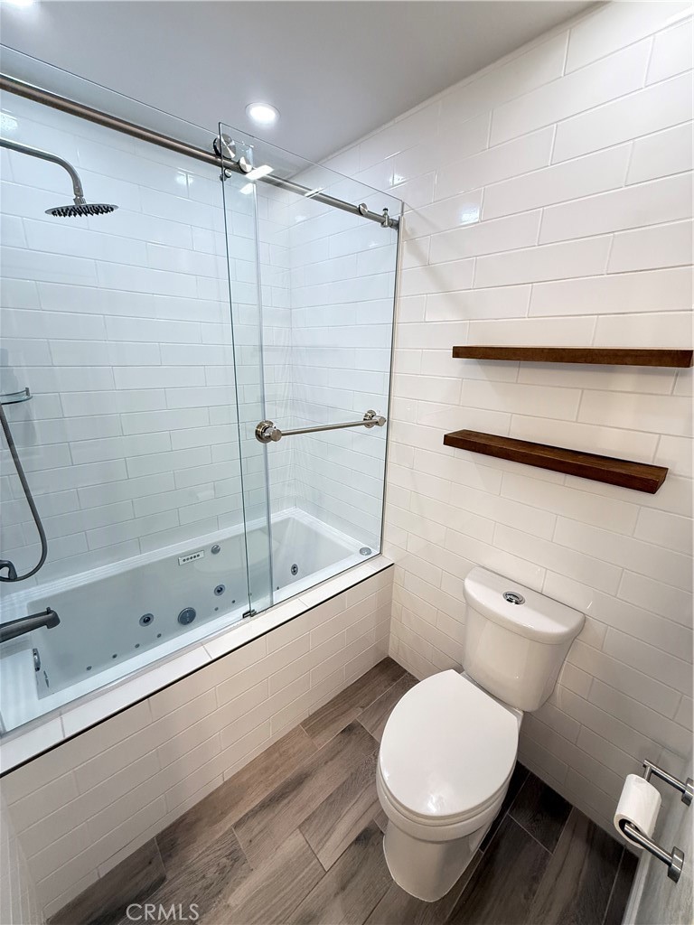 2244 Beechnut Road Tustin, CA 92780 - Photo 12 of 17 a bathroom with a toilet and a shower