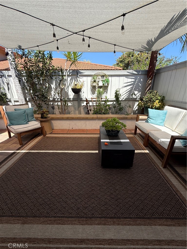 2244 Beechnut Road Tustin, CA 92780 - Photo 4 of 17 a view of a patio with couches table and chairs