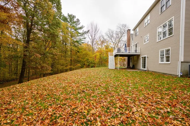 a view of a backyard of the house