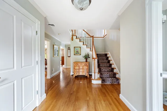 a view of entryway with wooden floor