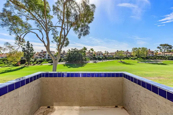 a view of swimming pool with a yard