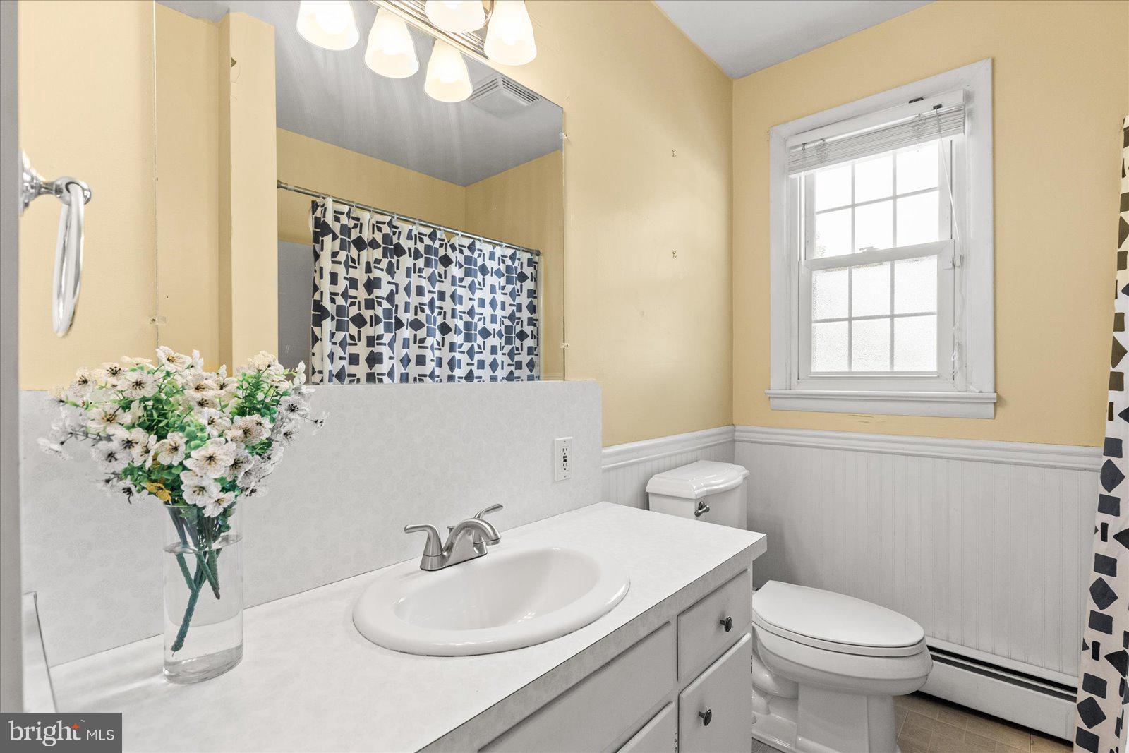 1562 Ridge Road Elizabethtown, PA 17022 - Photo 26 of 41 a bathroom with a sink toilet and a mirror
